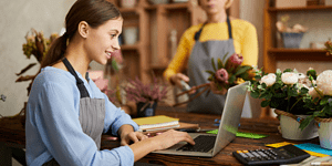 Basics of small business accounting, business owner doing accounting