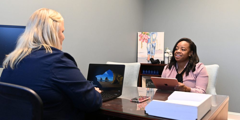 two women meeting accounting for nonprofit